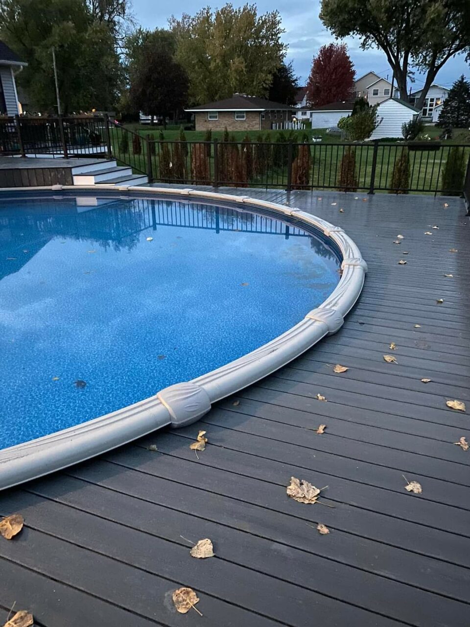 multi-level deck with a pool.