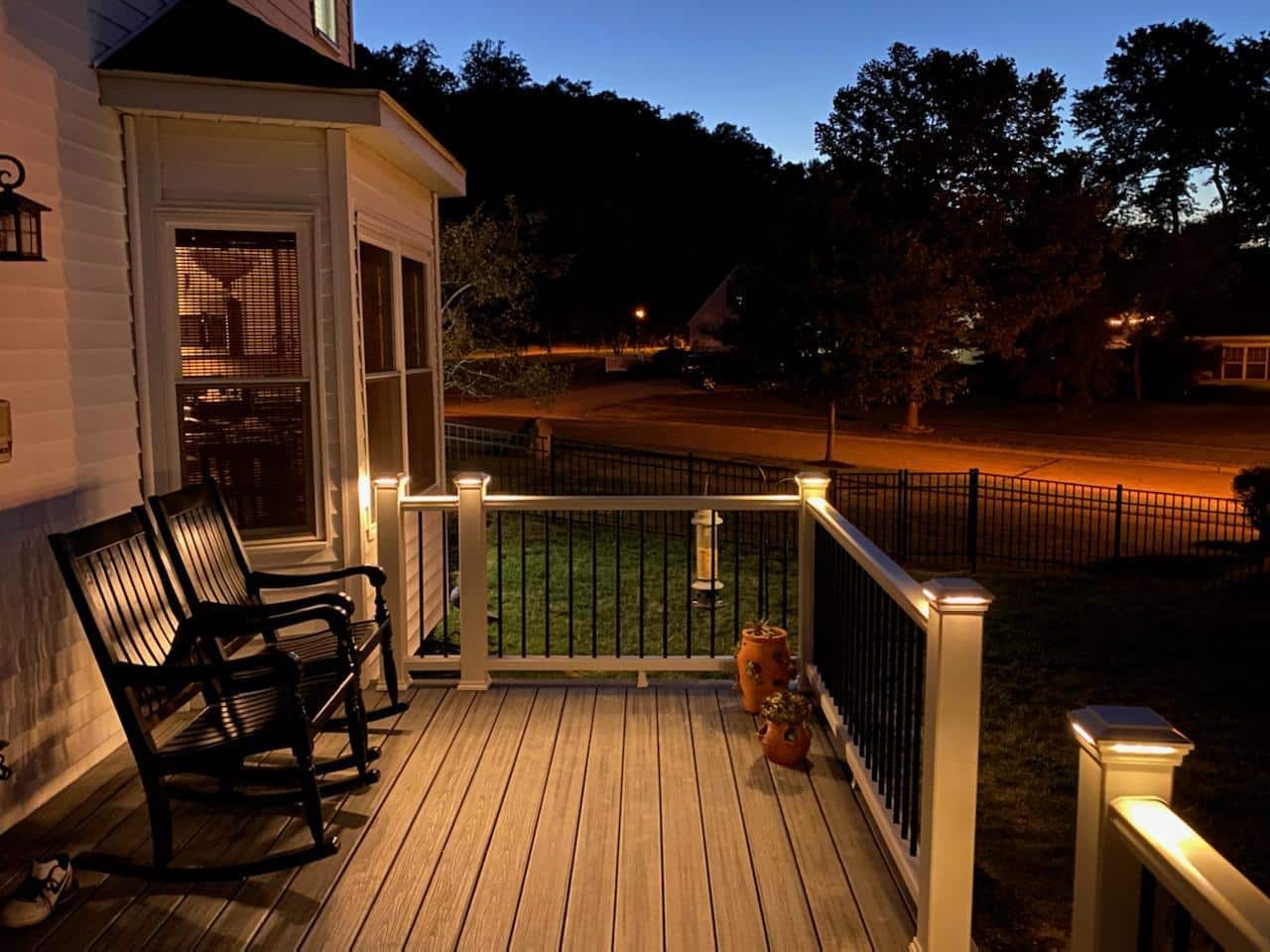 composite deck railing and post cap lights.