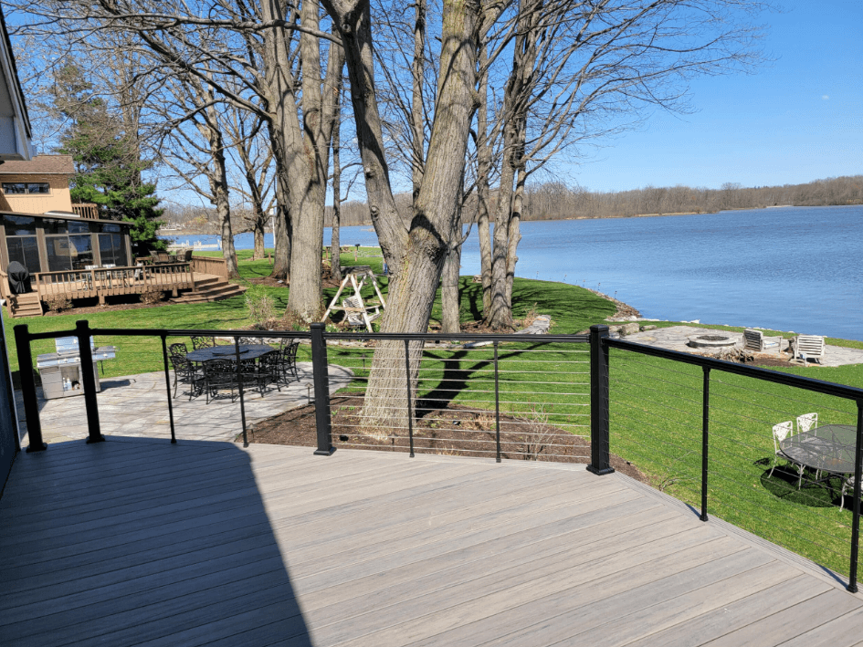 photo of a custom deck with a patio and outdoor dining area - patio pavers materials in Ohio