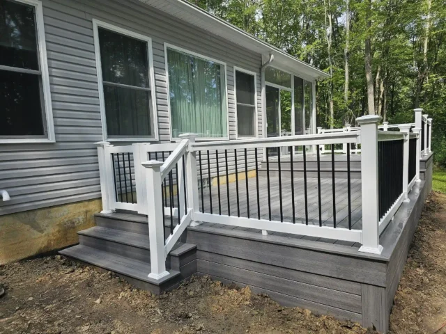 Photo of a multi-level deck with gate and deck railing